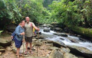 a european couple doing the jungle trek tour