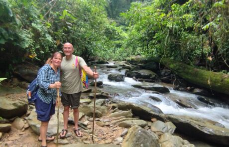 a european couple doing the jungle trek tour