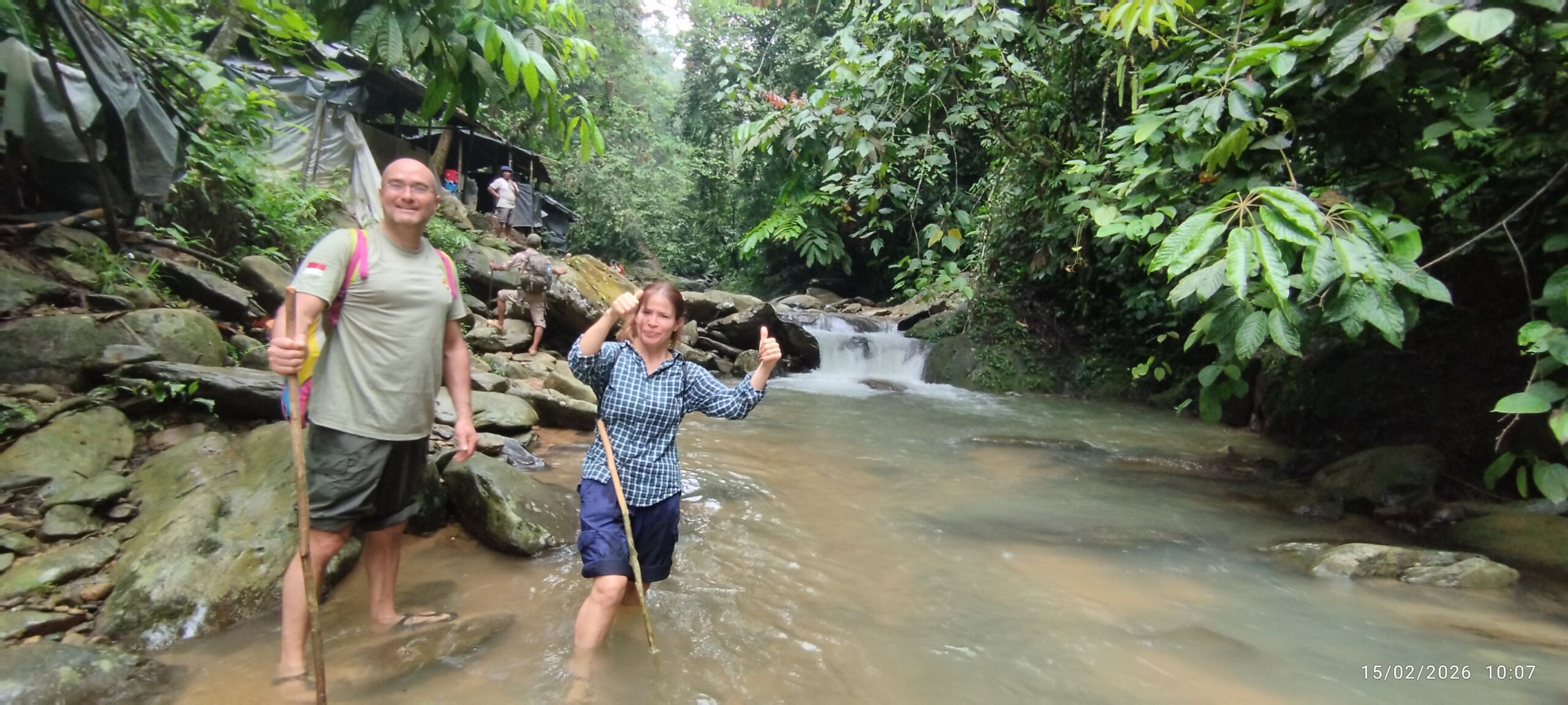 European tourist doing the sumatra jungle trek tour