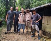 Posing in front of the jungle shelter