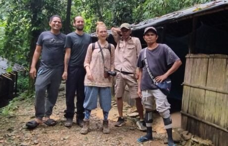 Posing in front of the jungle shelter