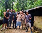 Posing in front of the jungle shelter in the sumatra jungle bukit lawang