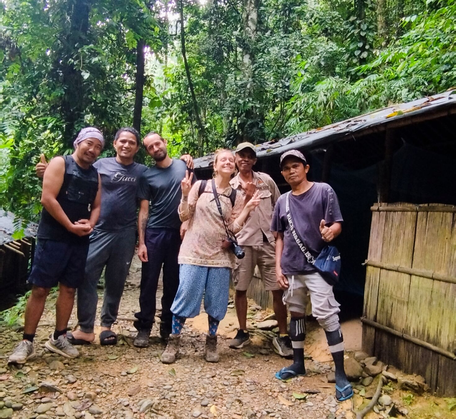 Posing in front of the jungle shelter in the sumatra jungle bukit lawang