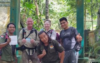 Posing at the National park border gate