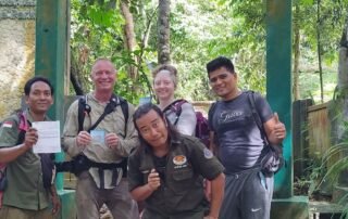 Posing at the National park border gate