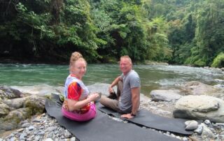 Sitting down on the river bank sumatra jungle