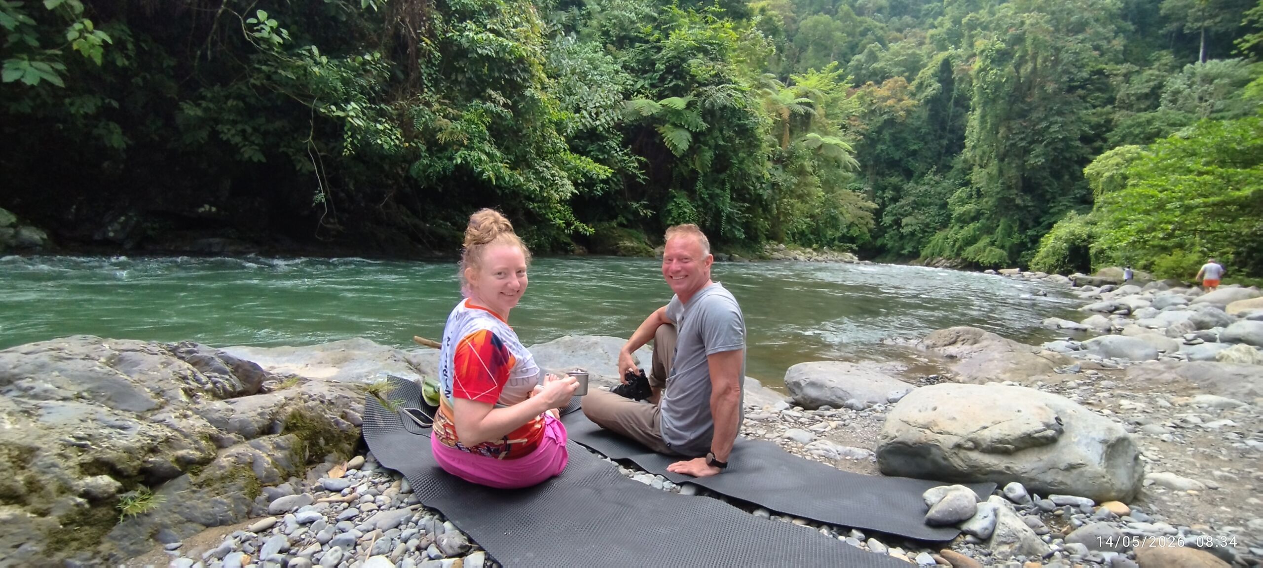 Sitting down on the river bank sumatra jungle
