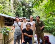 Posing at the front of the jungle shelter