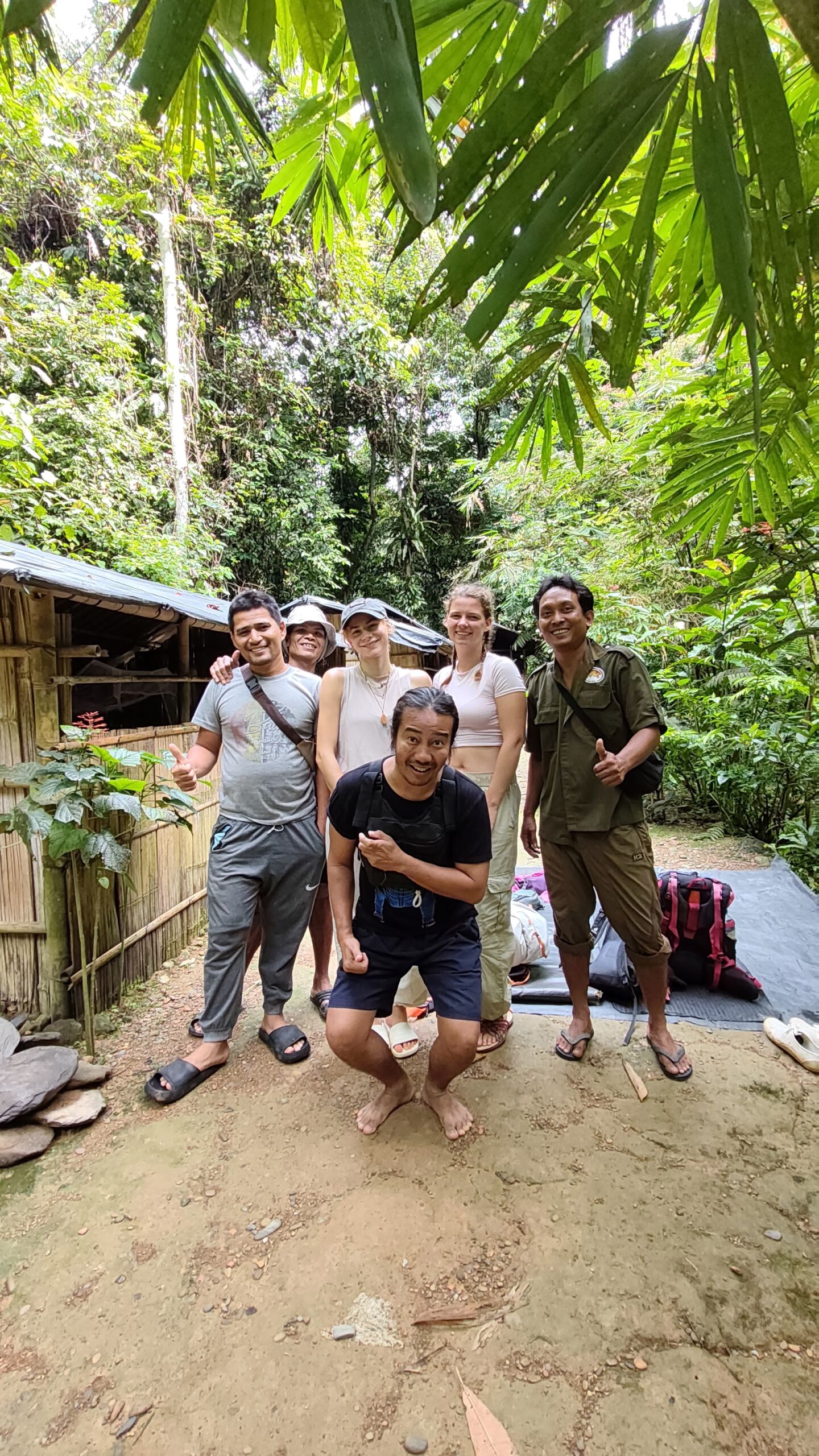 Posing at the front of the jungle shelter