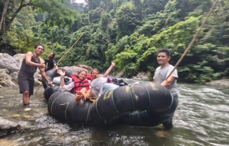 Tube rafting returning from the jungle trek tour in bukit lawang